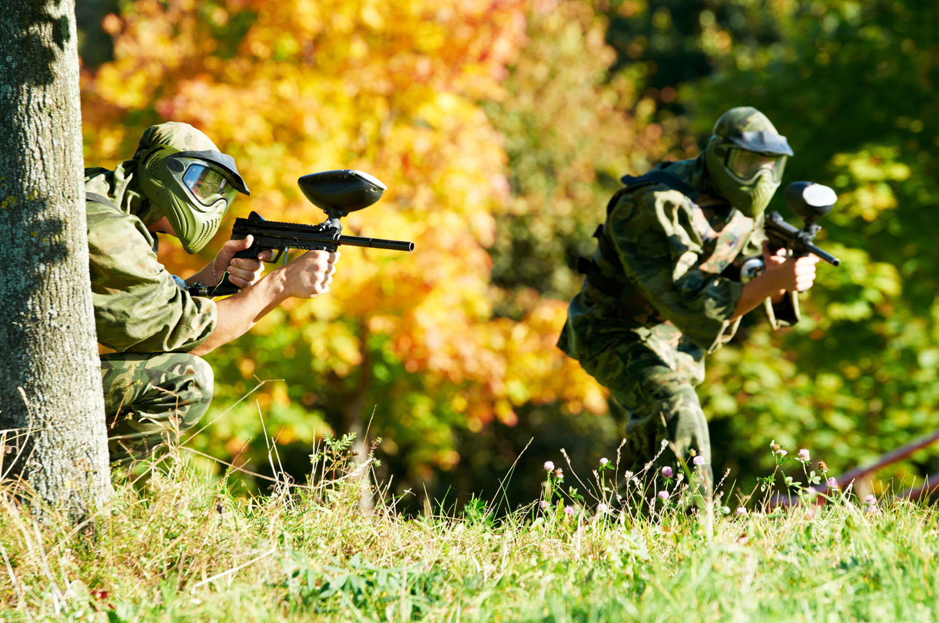 two paintball players
